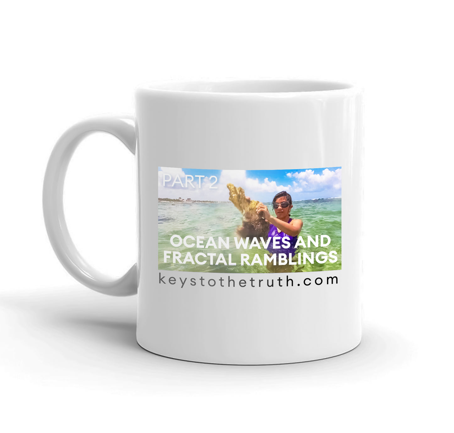 A white mug with the thumbnail print of the youtube video "ocean waves and fractal ramblings" and the website "keystothetruth.com".