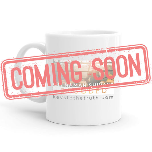 a stamp in red that says "coming soon" and a white Mug with a print on it in the background